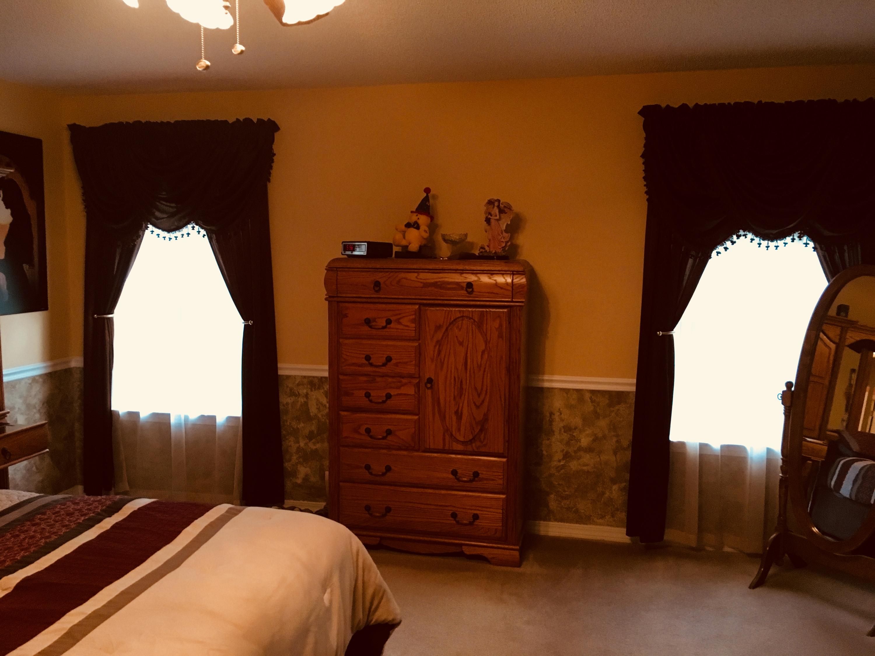 6135 Holloway Road Baker, FL 32531 - Photo 17 of 23 a bedroom with a bed and a mirror