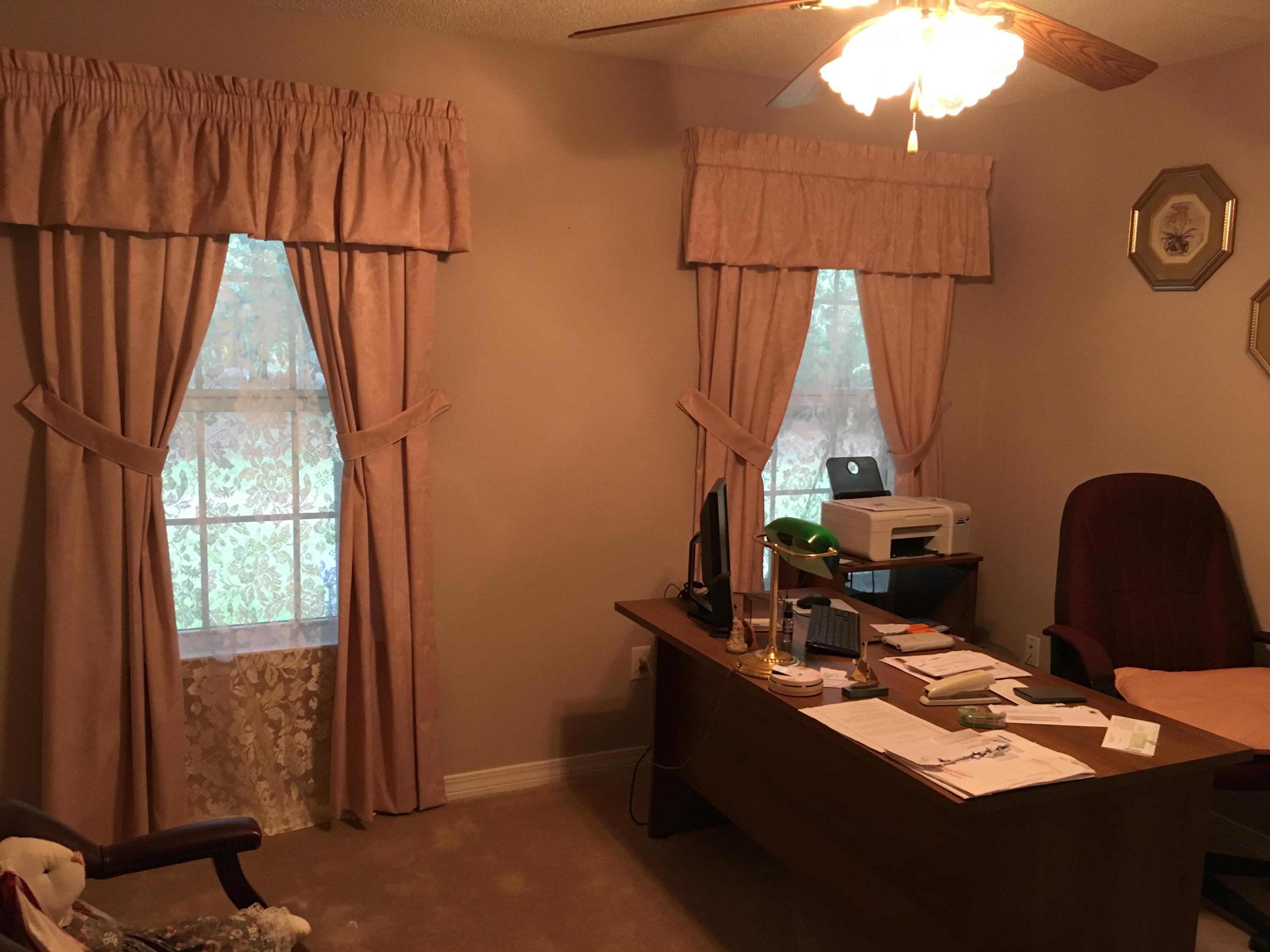 6135 Holloway Road Baker, FL 32531 - Photo 22 of 23 a table with chairs and window in it