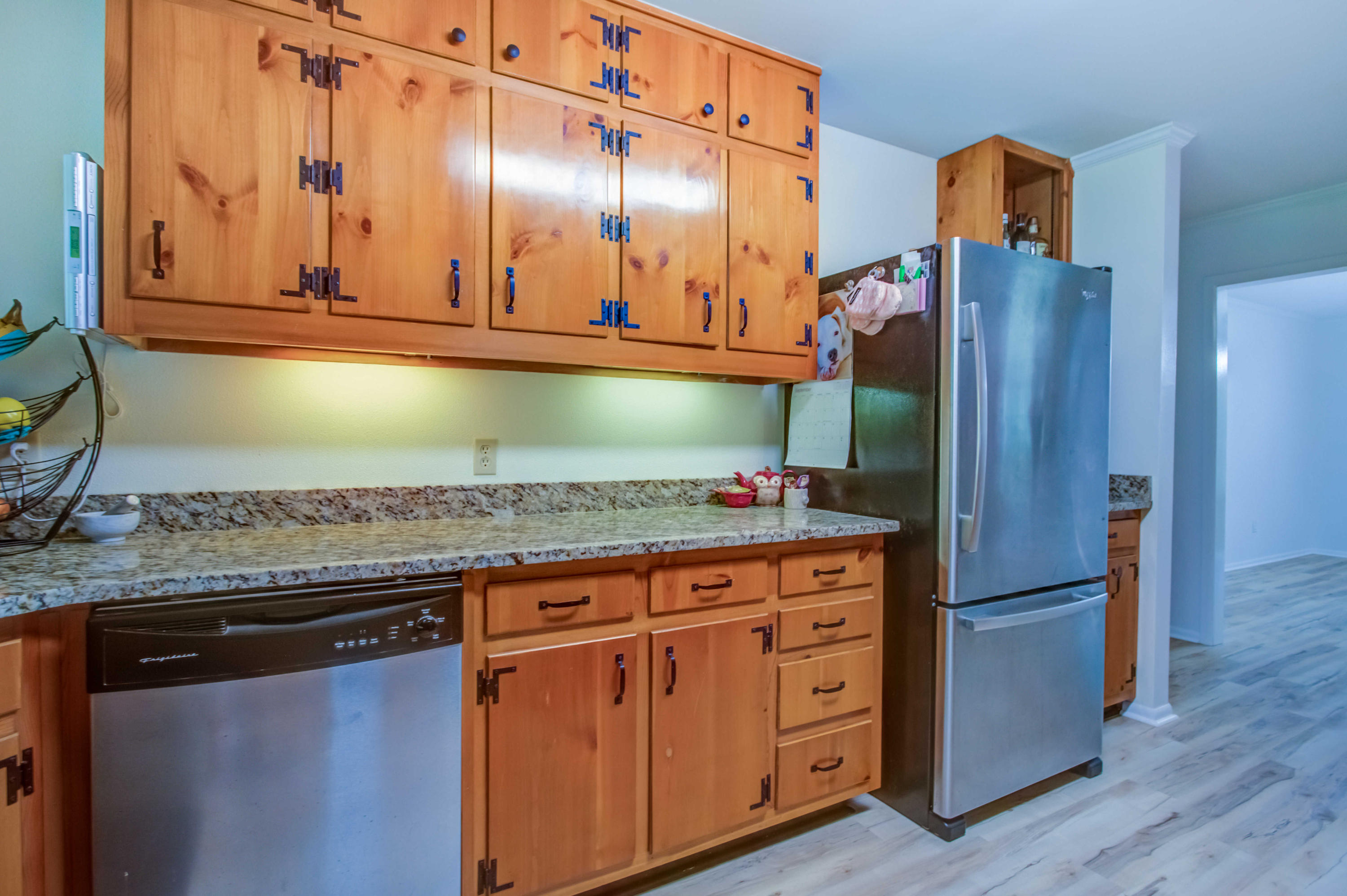 6116 Pine Ridge Lane Crestview, FL 32539 - Photo 18 of 45 a kitchen with stainless steel appliances granite countertop a refrigerator and a sink