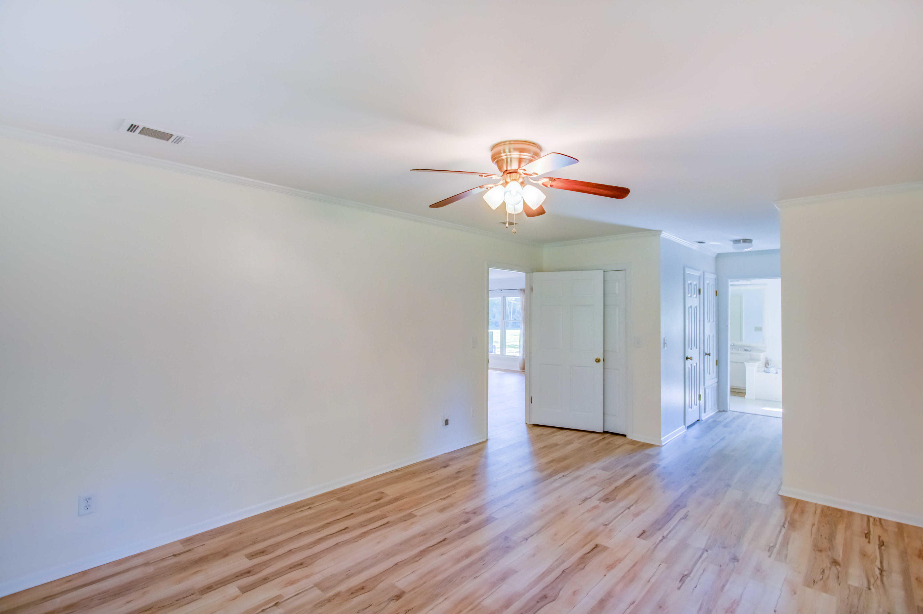 6116 Pine Ridge Lane Crestview, FL 32539 - Photo 23 of 45 a view of empty room with wooden floor