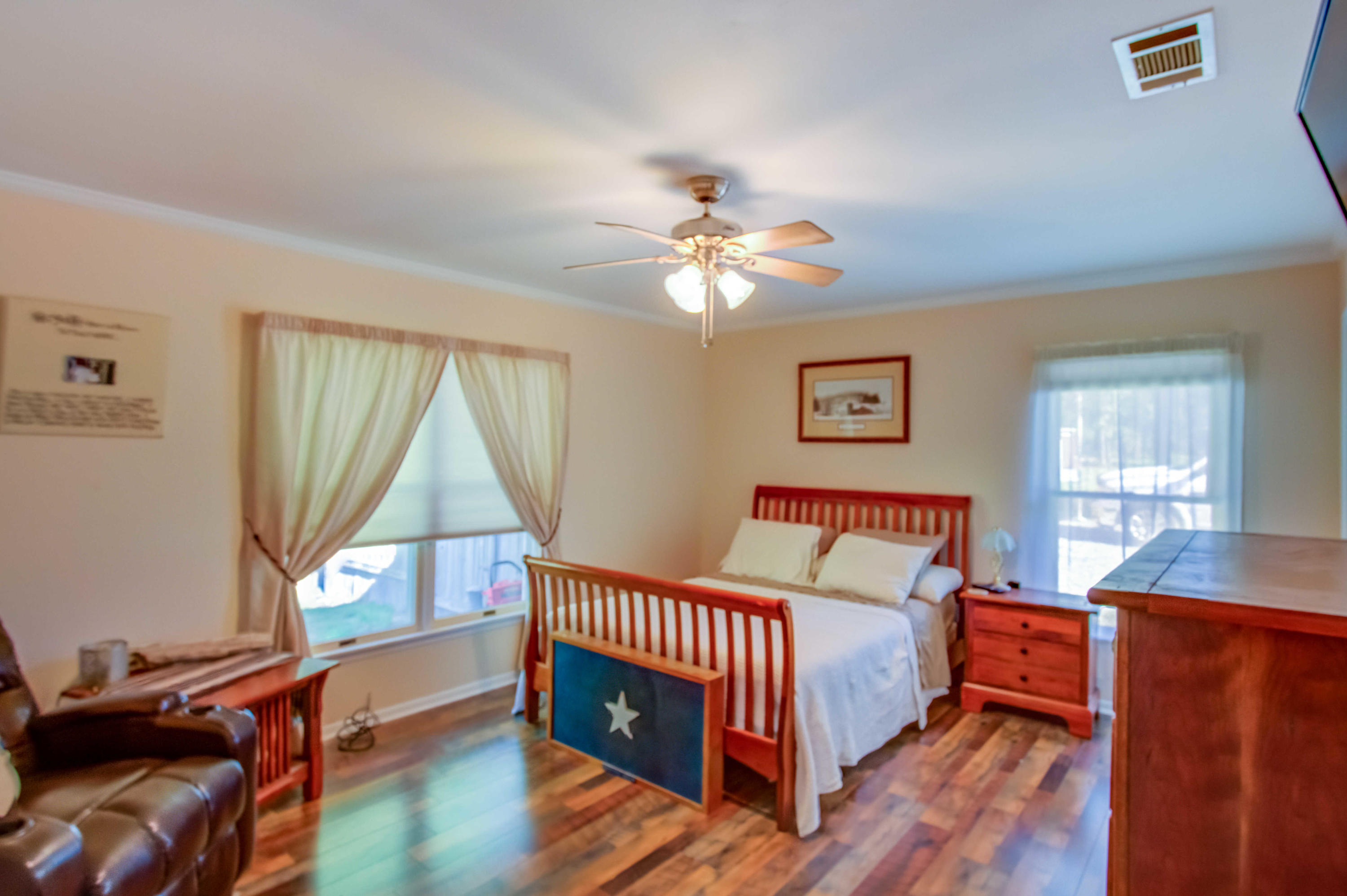 6116 Pine Ridge Lane Crestview, FL 32539 - Photo 28 of 45 a bedroom with a bed and a window