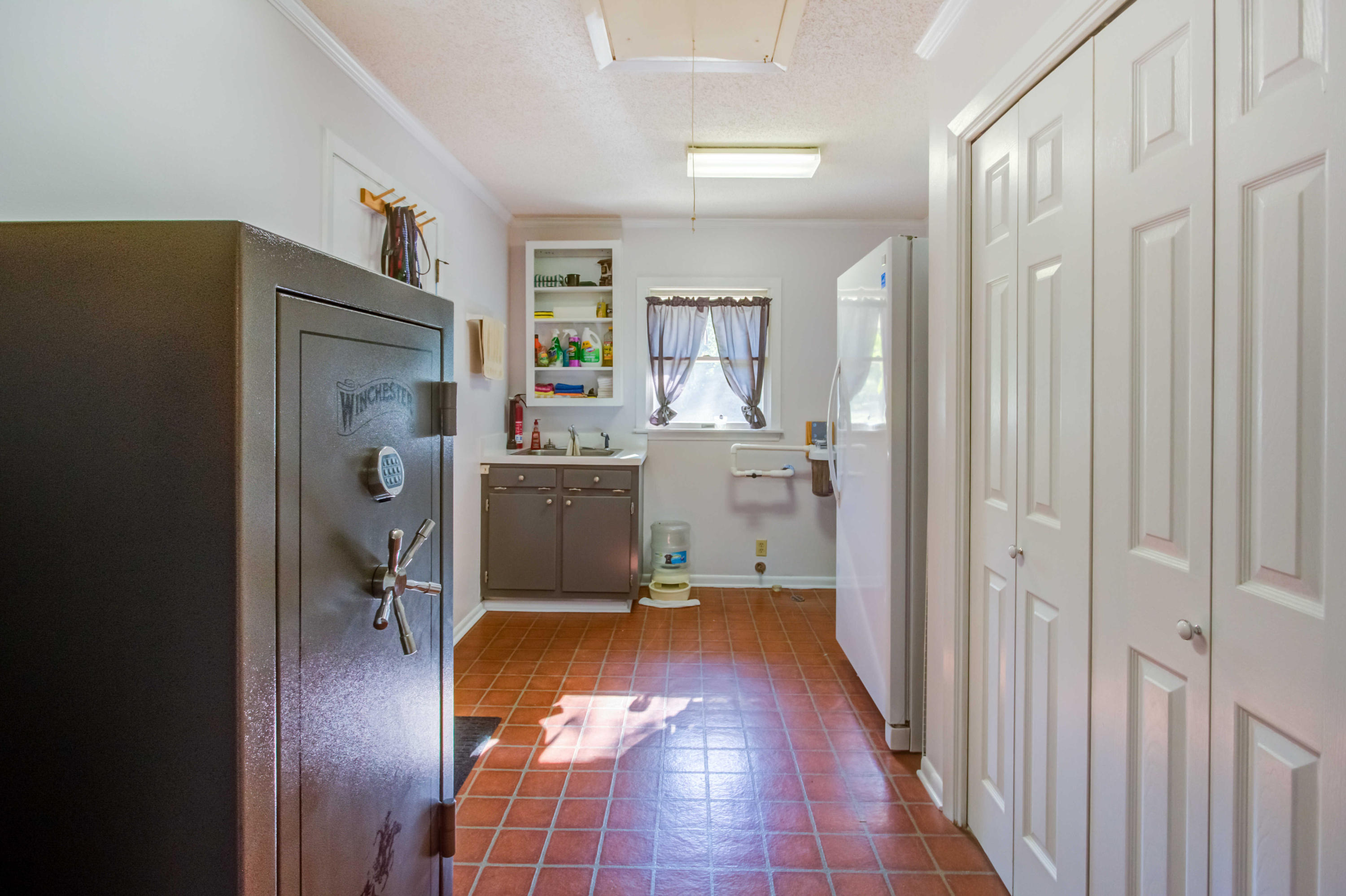 6116 Pine Ridge Lane Crestview, FL 32539 - Photo 29 of 45 a view of kitchen with furniture and wooden floor