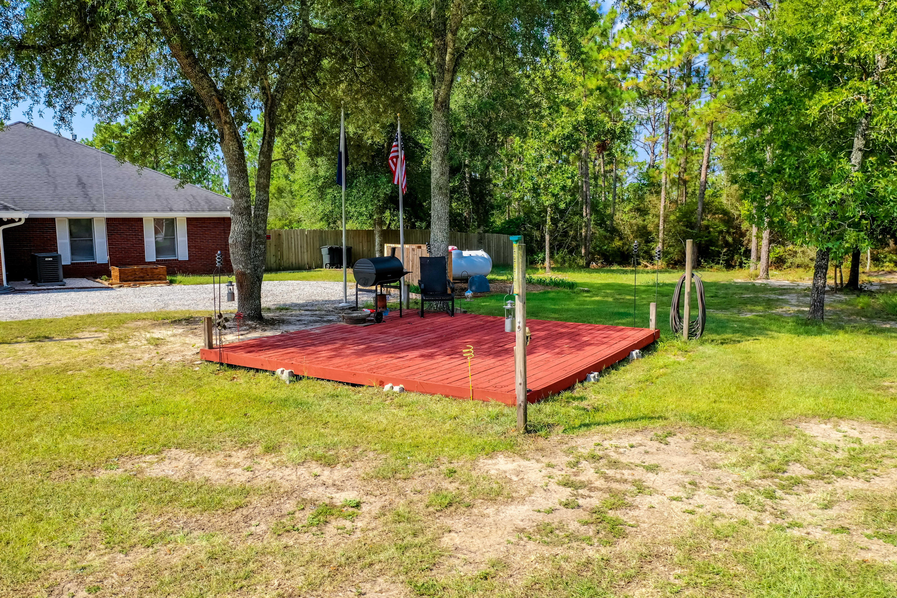 6116 Pine Ridge Lane Crestview, FL 32539 - Photo 36 of 45 a view of a backyard with swimming pool