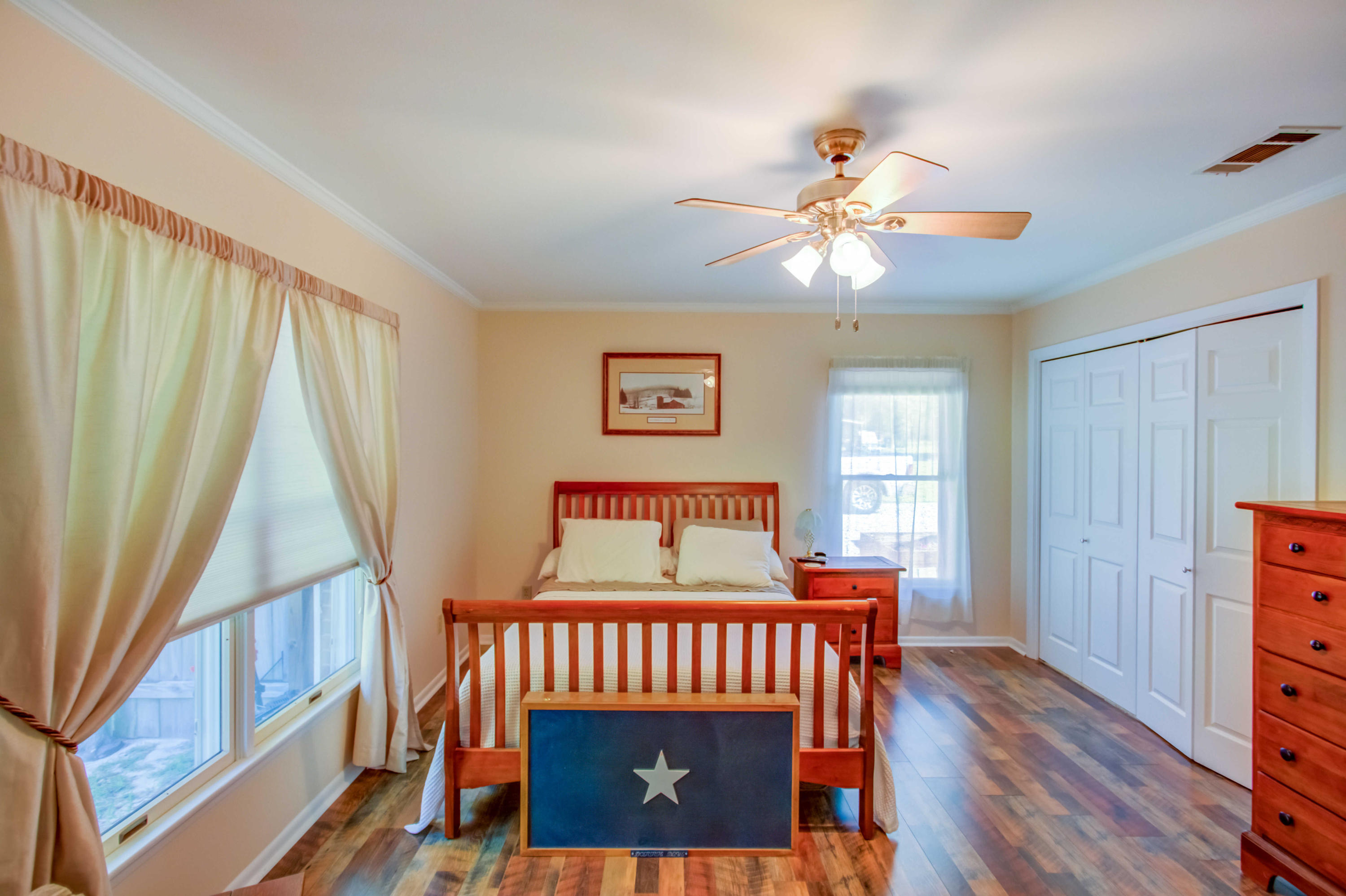 6116 Pine Ridge Lane Crestview, FL 32539 - Photo 42 of 45 a bedroom with a bed and a window