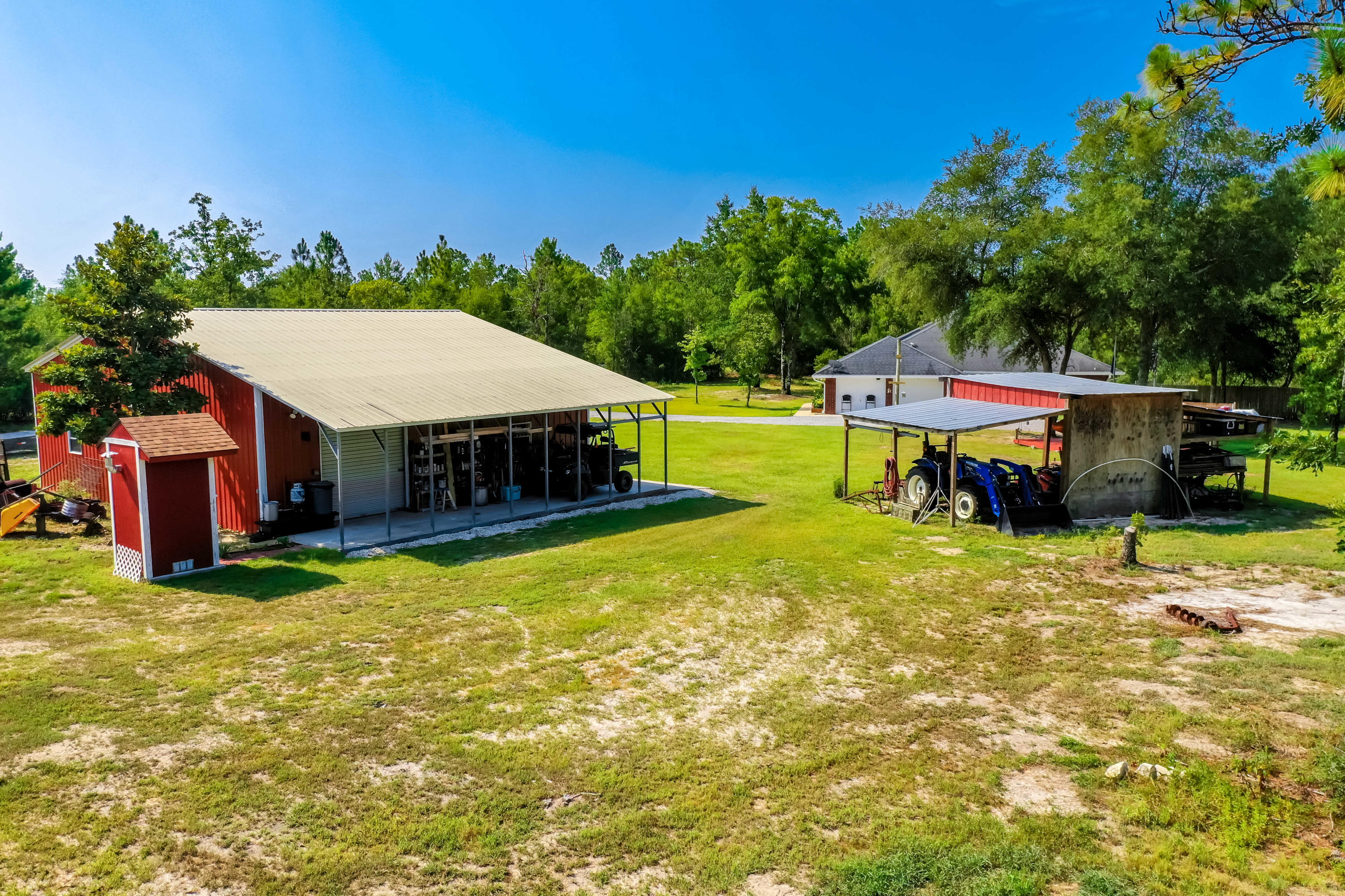 6116 Pine Ridge Lane Crestview, FL 32539 - Photo 7 of 45 a view of a house with swimming pool and sitting area