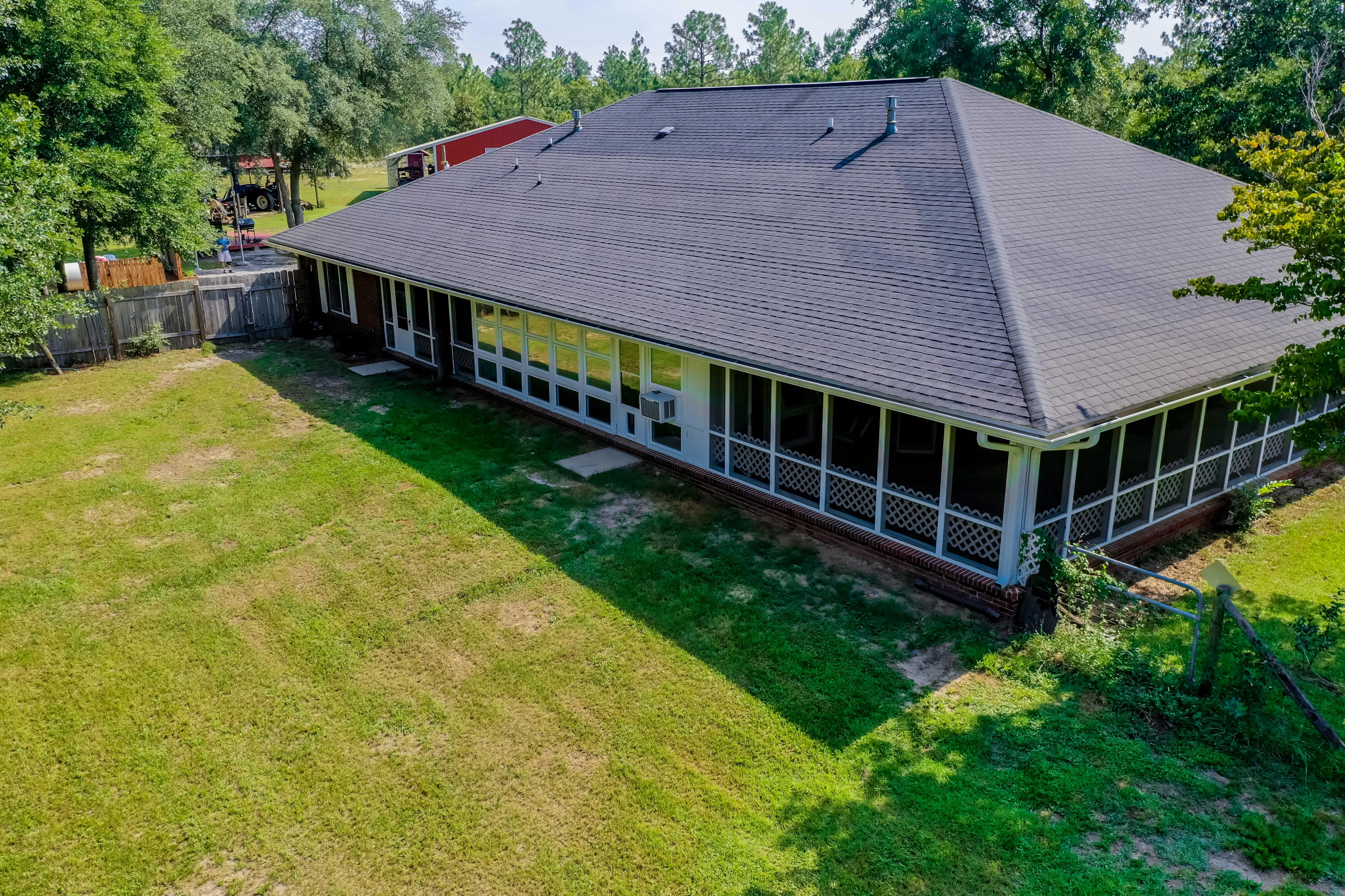 6116 Pine Ridge Lane Crestview, FL 32539 - Photo 9 of 45 a aerial view of a house with a yard