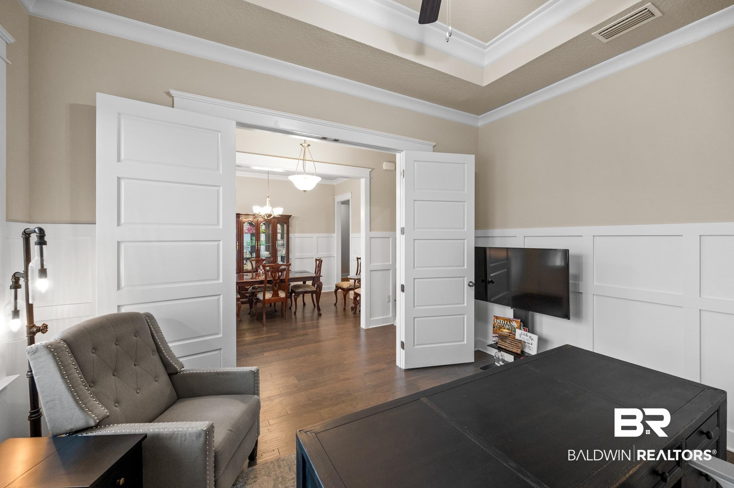 31355 Limpkin Street Daphne, AL 36527 - Photo 8 of 57 Office featuring ceiling fan with notable chandelier, ornamental molding, and dark wood-type flooring