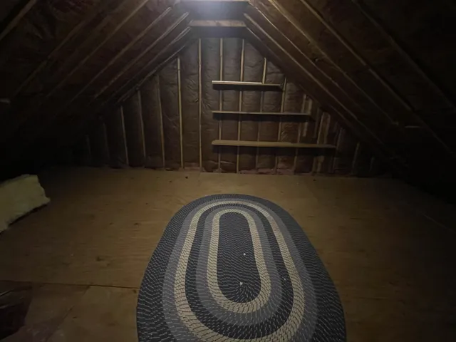 a view of empty room with sliding glass door