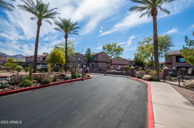 a view of a street with a building