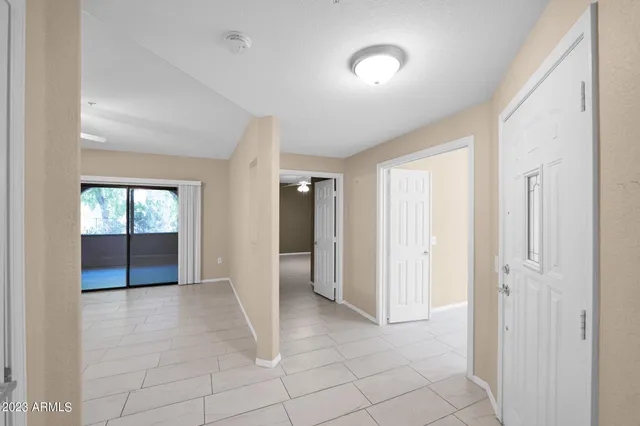 an empty room with windows