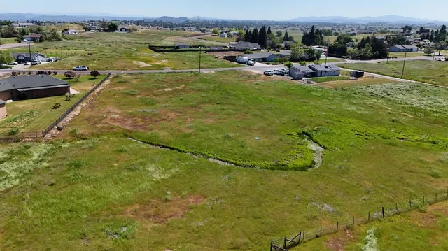a view of a lake with outdoor space