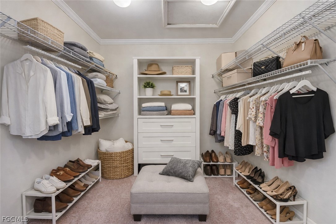 5304 Glenlivet Road Fort Myers, FL 33907 - Photo 12 of 19 a walk in closet with clothes and shoes