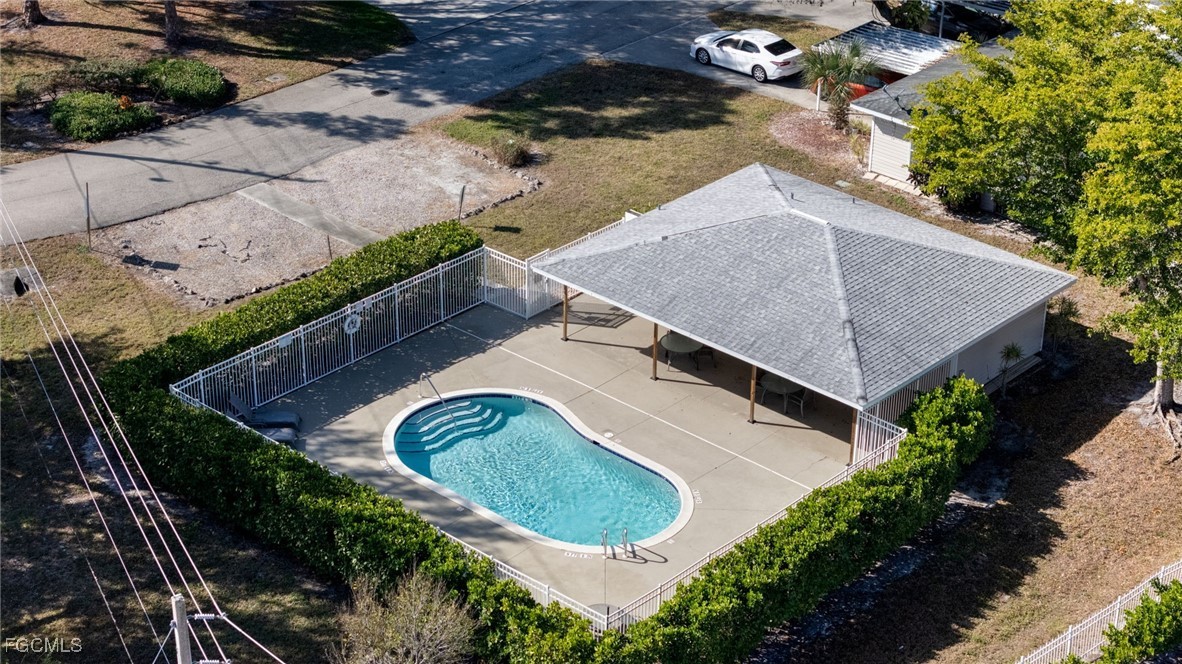 5304 Glenlivet Road Fort Myers, FL 33907 - Photo 17 of 19 an aerial view of a house a yard and outdoor seating