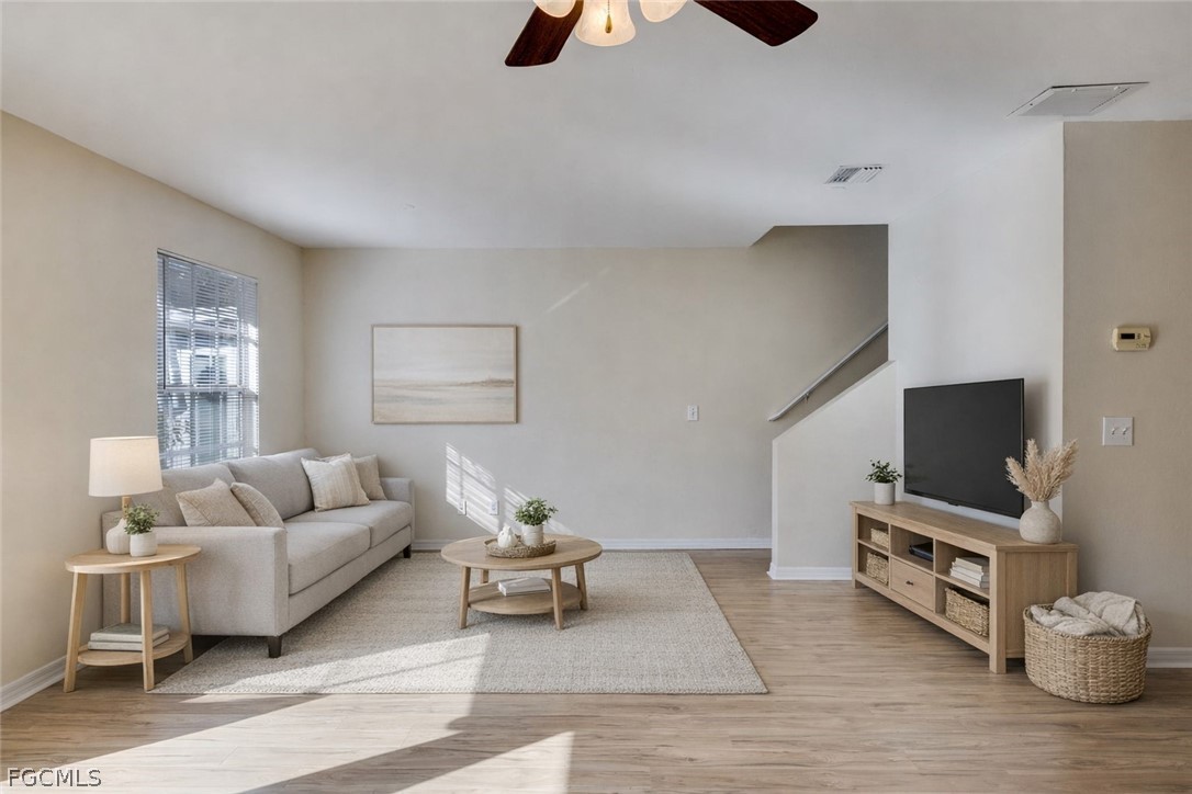 5304 Glenlivet Road Fort Myers, FL 33907 - Photo 4 of 19 a living room with furniture and a flat screen tv
