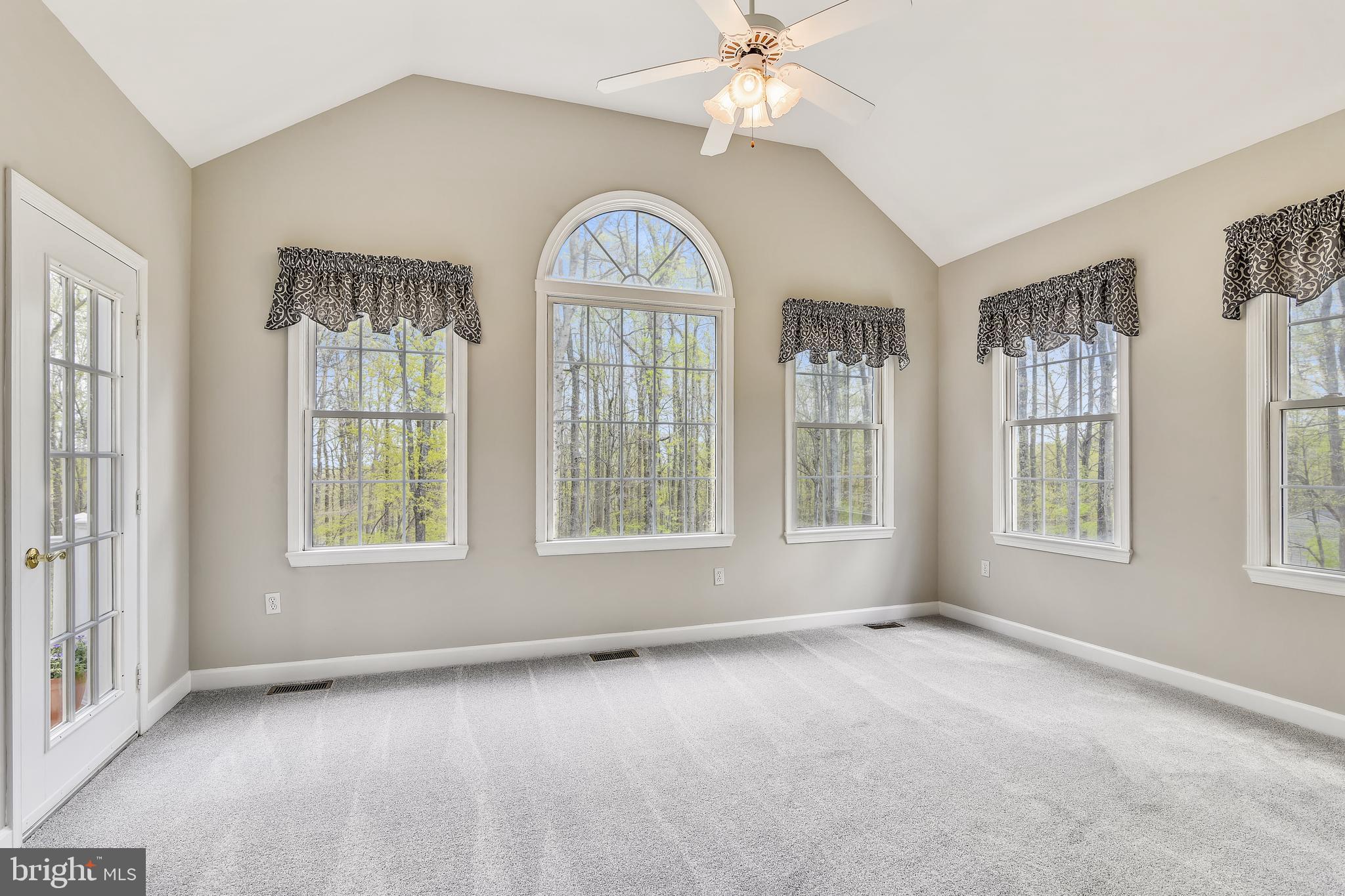7173 Baldwin Ridge Road Warrenton, VA 20187 - Photo 24 of 113 light filled sunroom with ceiling fan