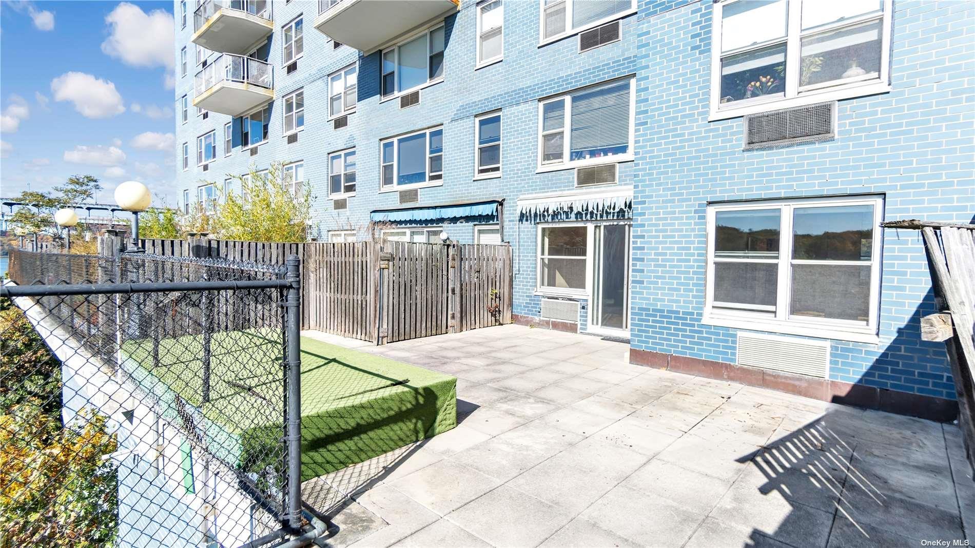 2400 Johnson Avenue, Unit 1B Bronx, NY 10463 - Photo 16 of 29 a view of a building with a bench