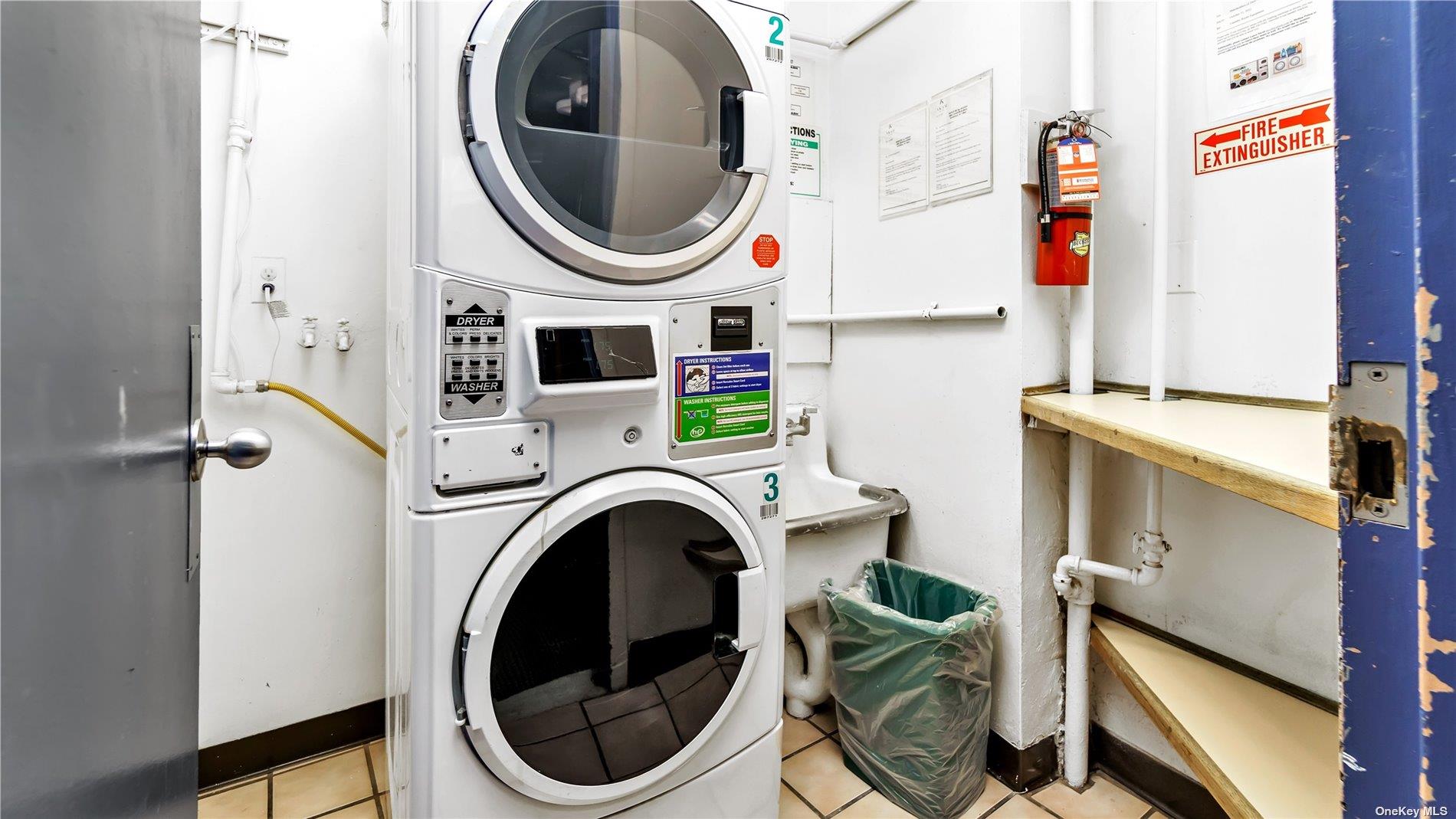 2400 Johnson Avenue, Unit 1B Bronx, NY 10463 - Photo 20 of 29 a utility room with dryer and washer