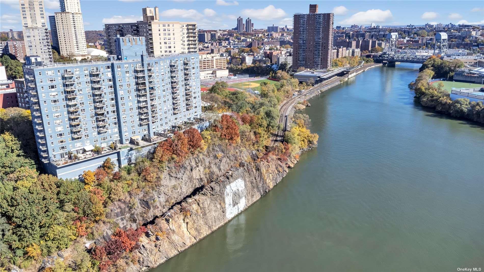 2400 Johnson Avenue, Unit 1B Bronx, NY 10463 - Photo 27 of 29 a city view with tall buildings