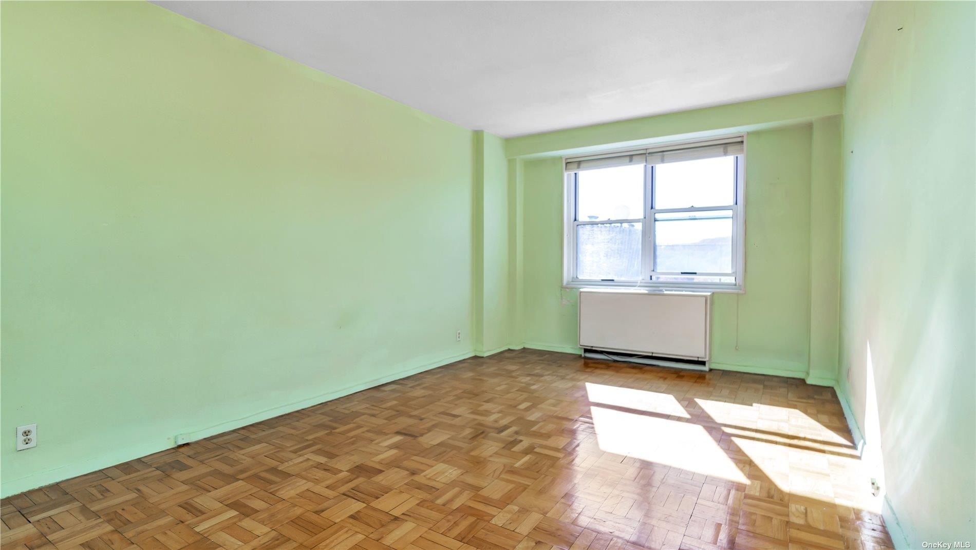 2400 Johnson Avenue, Unit 1B Bronx, NY 10463 - Photo 8 of 29 a view of an empty room and a window