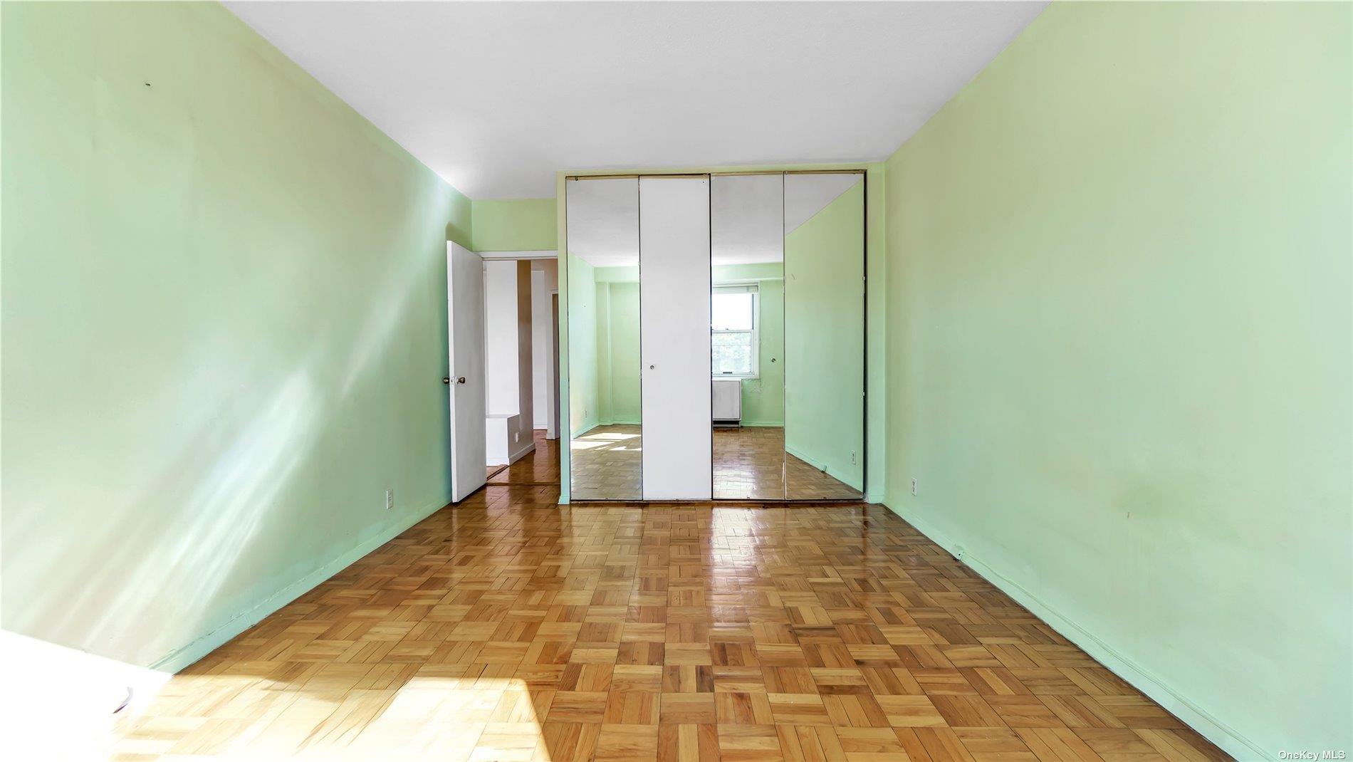 2400 Johnson Avenue, Unit 1B Bronx, NY 10463 - Photo 9 of 29 a view of empty room with floor to ceiling window