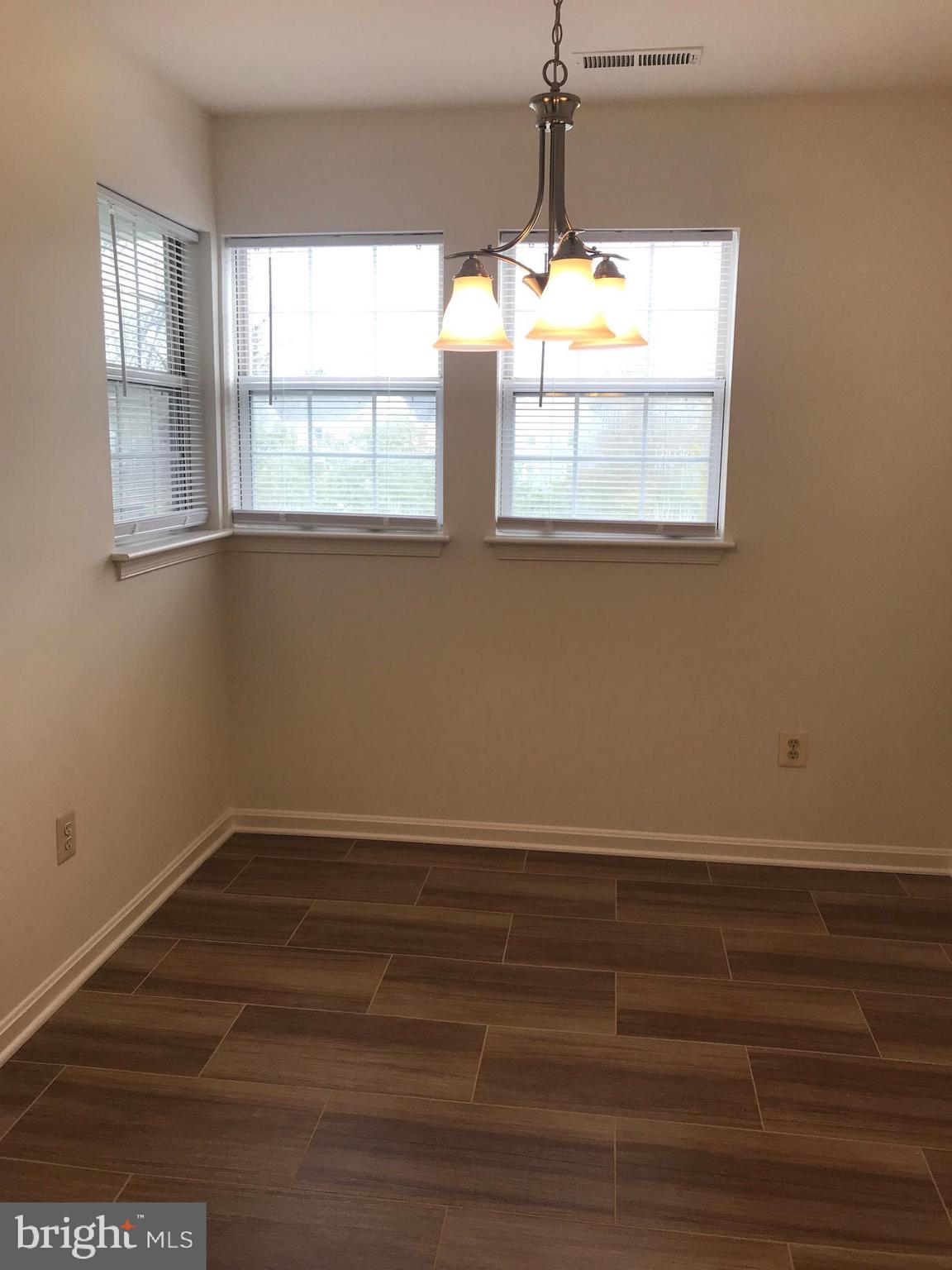 8591 Falls Run Road, Unit J Ellicott City, MD 21043 - Photo 6 of 16 Dining Room