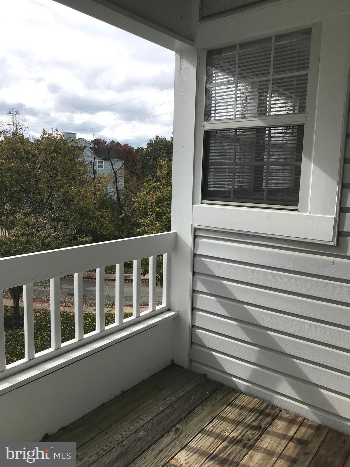 8591 Falls Run Road, Unit J Ellicott City, MD 21043 - Photo 10 of 16 Nice balcony overlooking common area