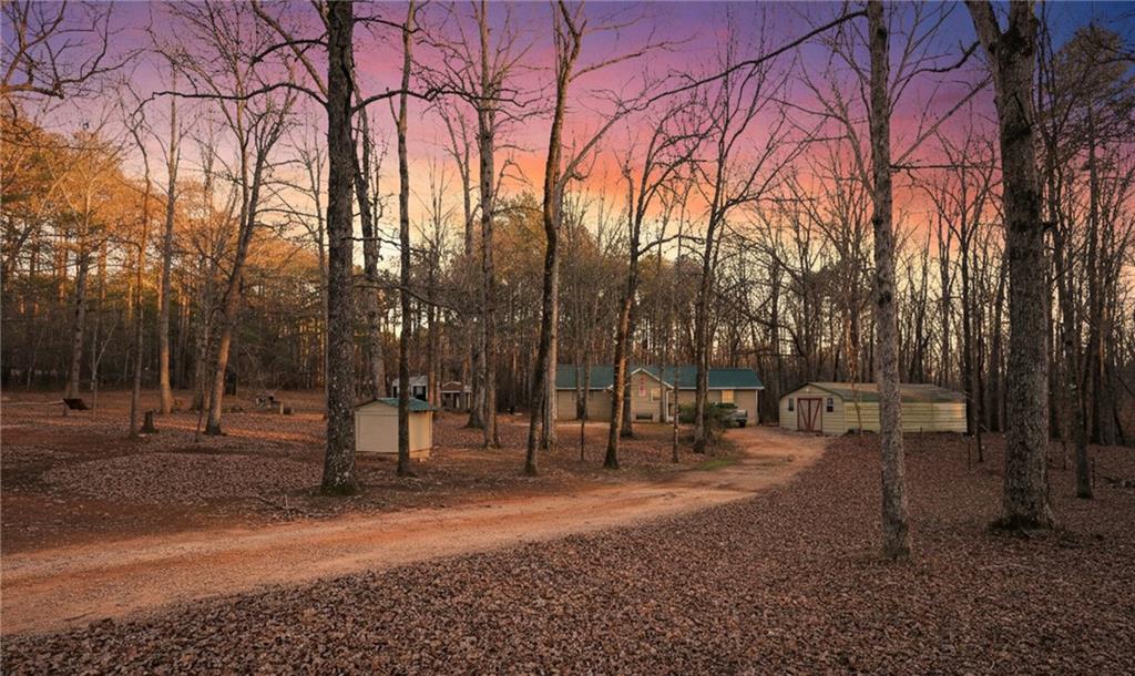 27 Hawks Trail Newborn, GA 30056 - Photo 1 of 29 a backyard of a house with lots of green space