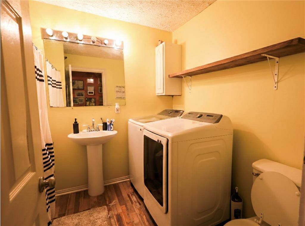 27 Hawks Trail Newborn, GA 30056 - Photo 14 of 29 a utility room with dryer and washer