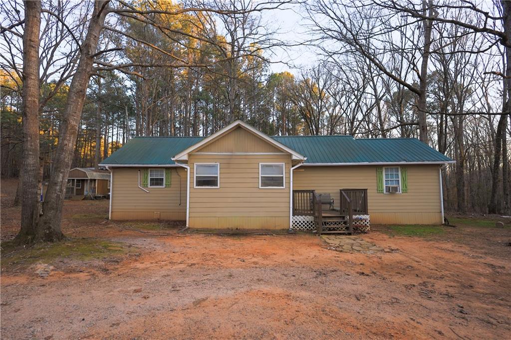 27 Hawks Trail Newborn, GA 30056 - Photo 26 of 29 a view of a house with a yard and garage