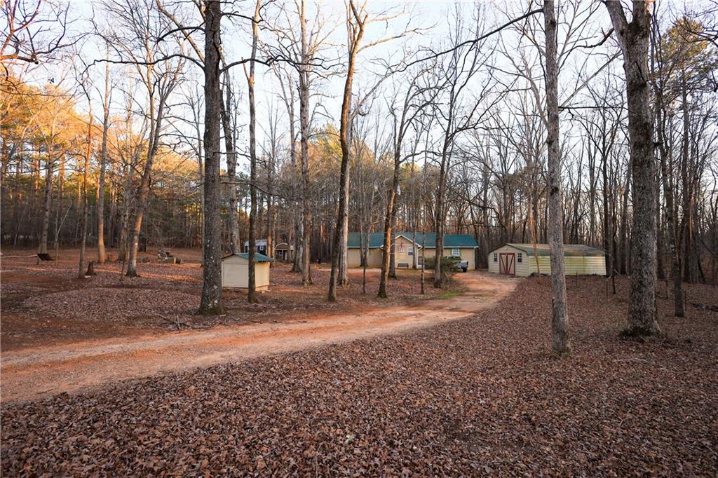 27 Hawks Trail Newborn, GA 30056 - Photo 27 of 29 a view of a park with large trees