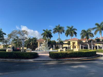 11723 Southwest 137th Path, Unit 11723 Miami, FL 33186 - Photo 29 of 30 a front view of multiple houses with yard