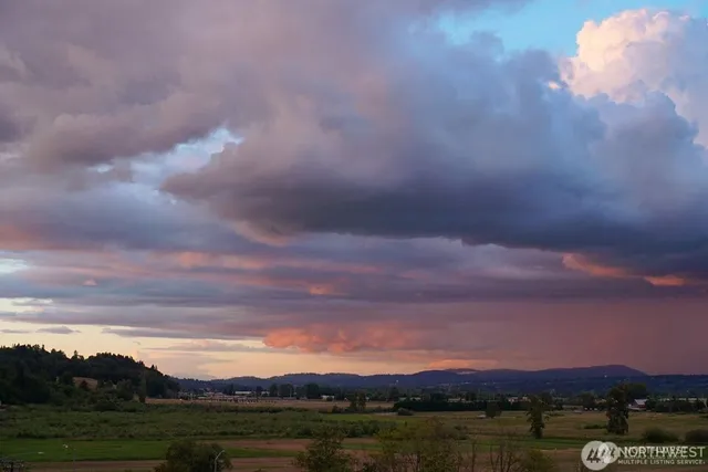 a view of sunset and lake