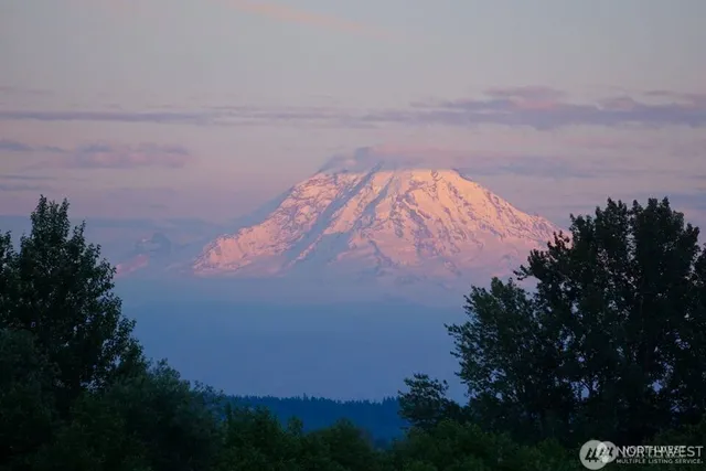 a view of lake and mountain in the back