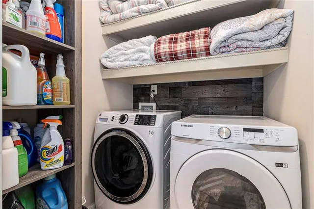 a utility room with dryer and washer