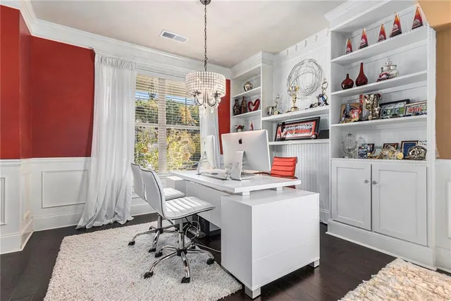 a workspace with furniture and window