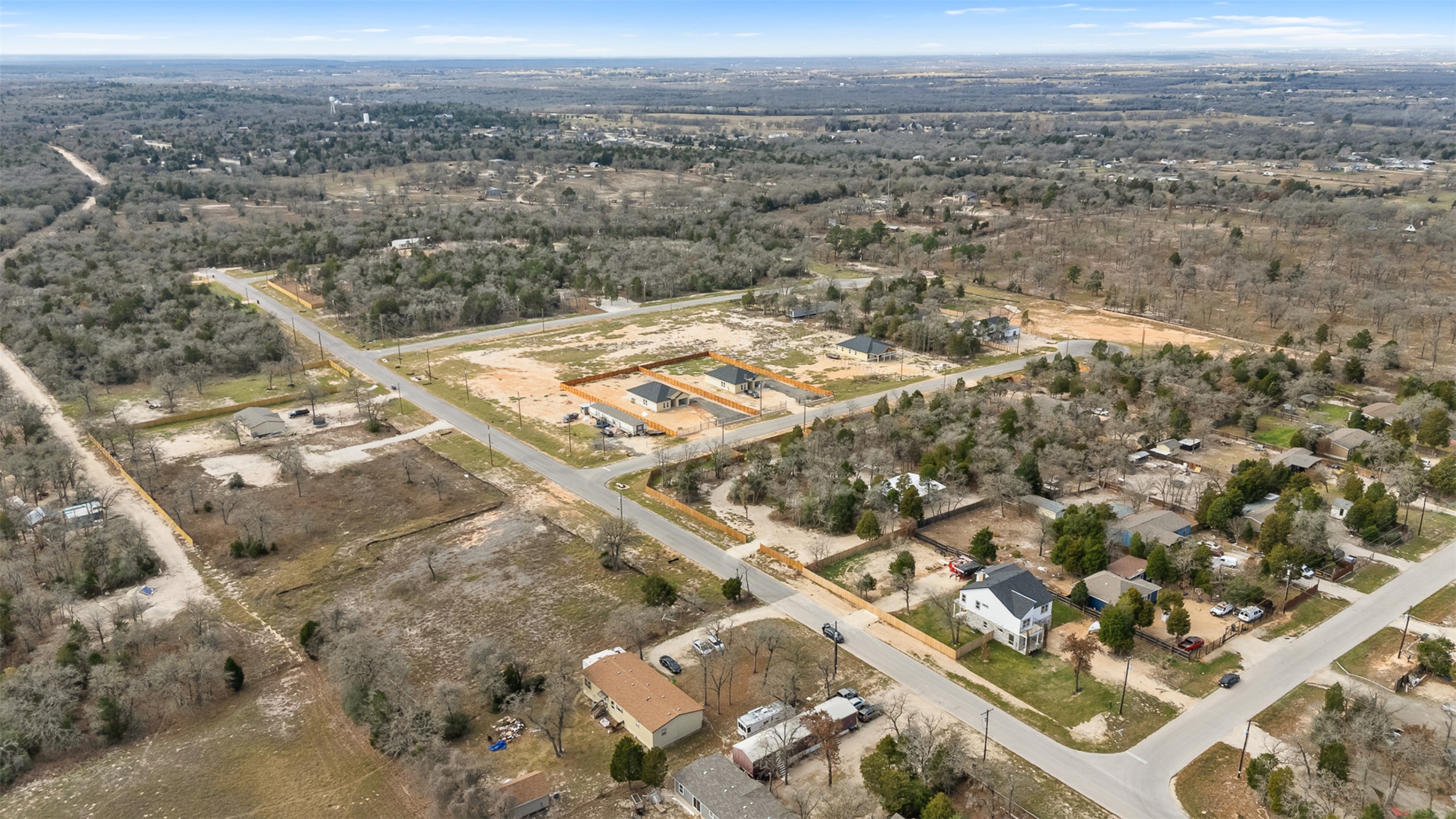 113 Las Alturas Drive Elgin, TX 78621 - Photo 4 of 5 Discover spacious lot availability in this verdant, developing community with mature trees.