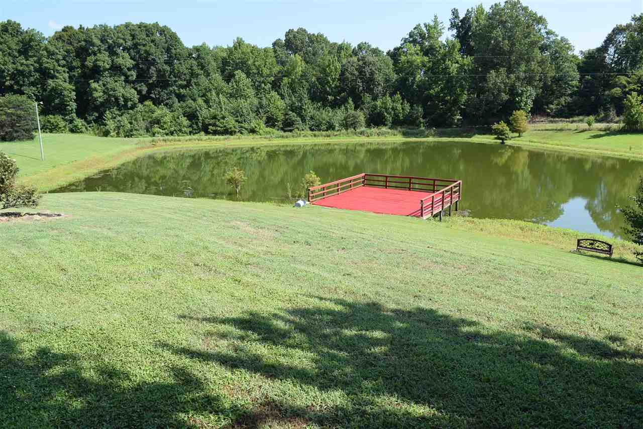 6546 Tracy Road Atoka, TN 38004 - Photo 6 of 24 a view of a lake with a park