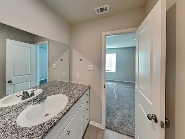 an empty room with closet area