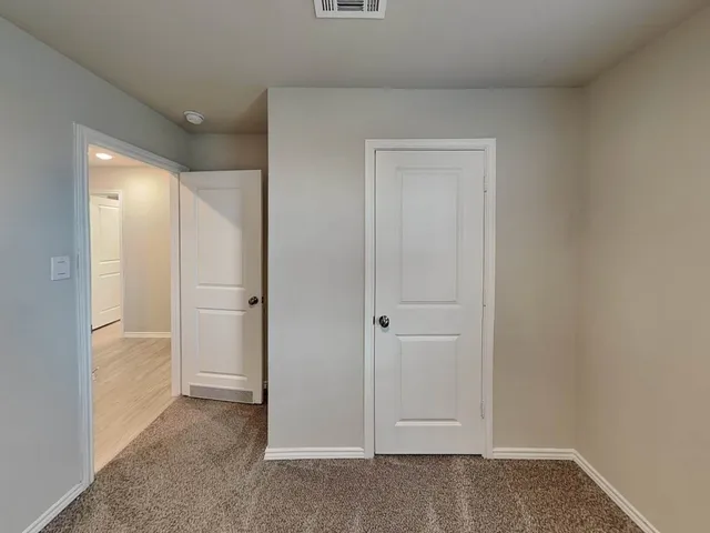 an empty room with a window