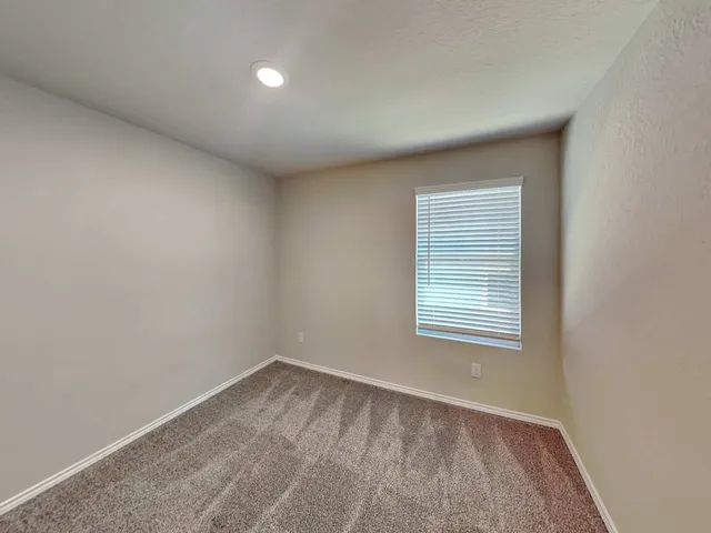 a view of a house with a roof deck