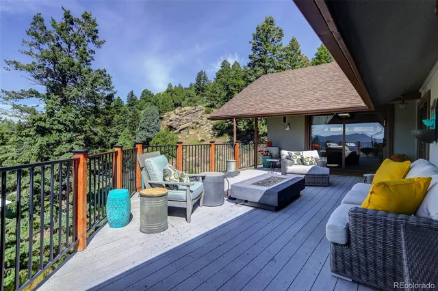 an aerial view of a house with a ocean view