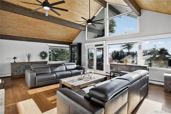 a kitchen with stainless steel appliances granite countertop a sink and a refrigerator
