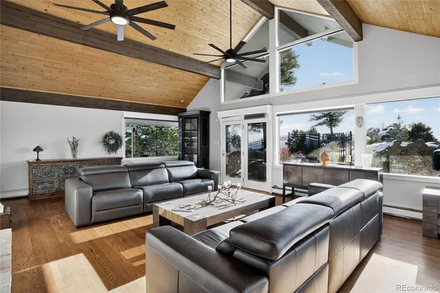 a kitchen with stainless steel appliances granite countertop a sink and a refrigerator