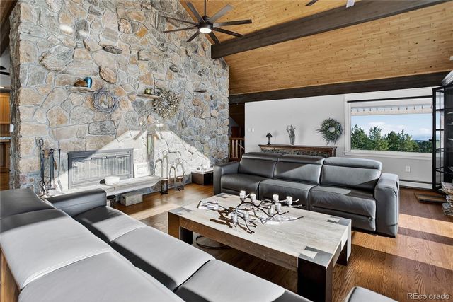 a very nice looking dining room with furniture window and outside view