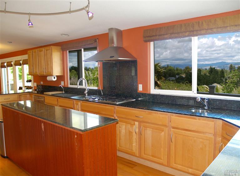 7168 Bloomfield Road Sebastopol, CA 95472 - Photo 1 of 1 a view of a kitchen with a sink and large window