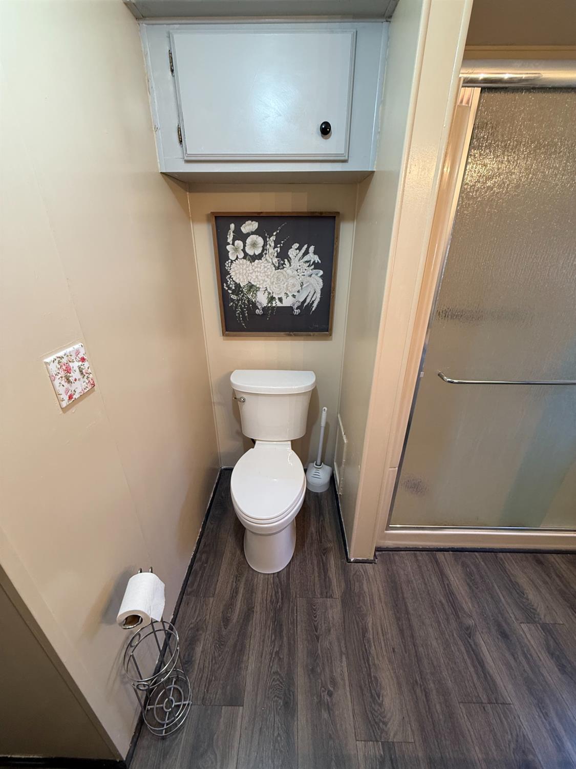 2933 Forebay Road, Unit 10 Pollock Pines, CA 95726 - Photo 18 of 28 a bathroom with a toilet and a shower