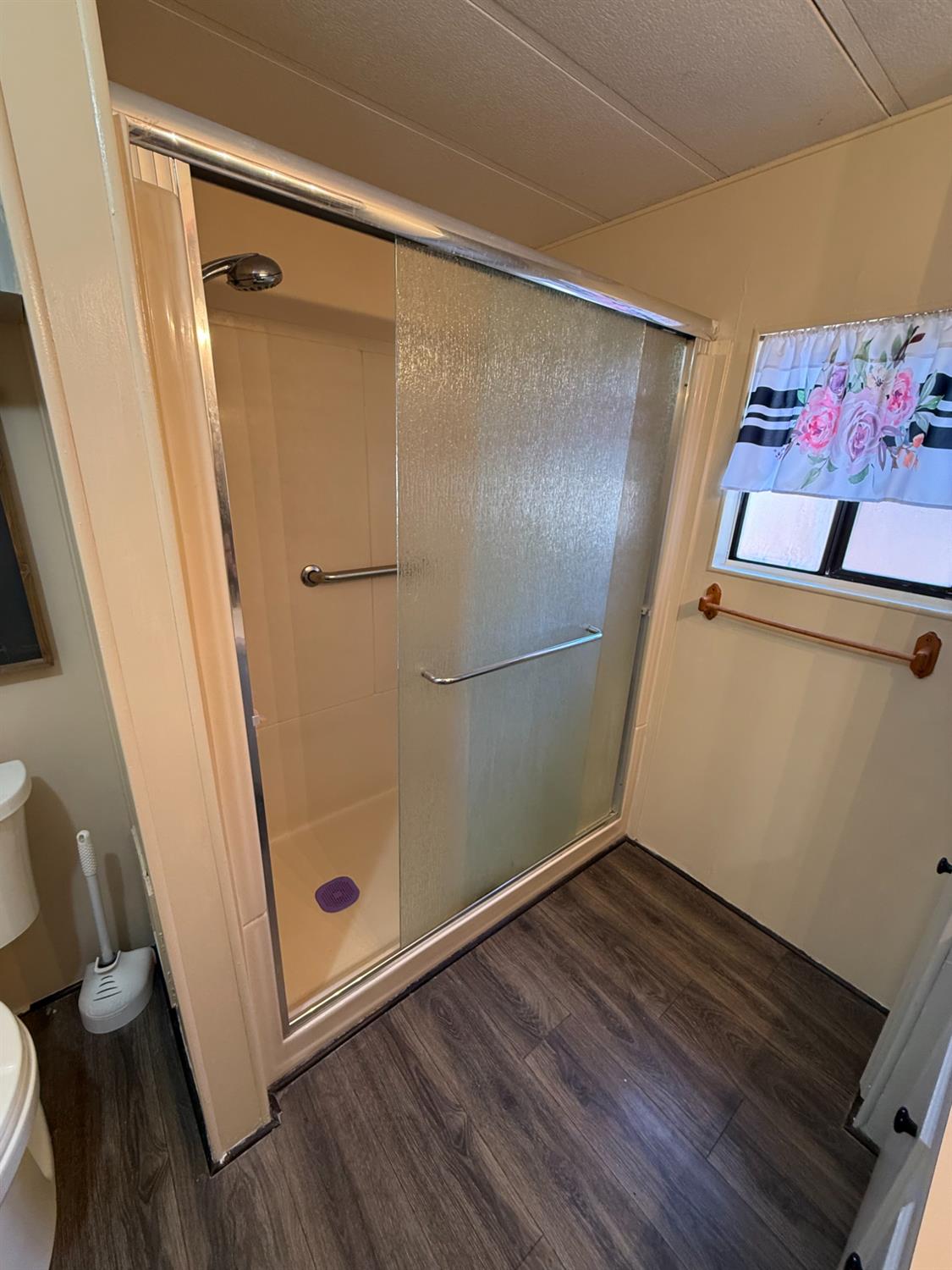 2933 Forebay Road, Unit 10 Pollock Pines, CA 95726 - Photo 19 of 28 a bathroom with a shower and a sink