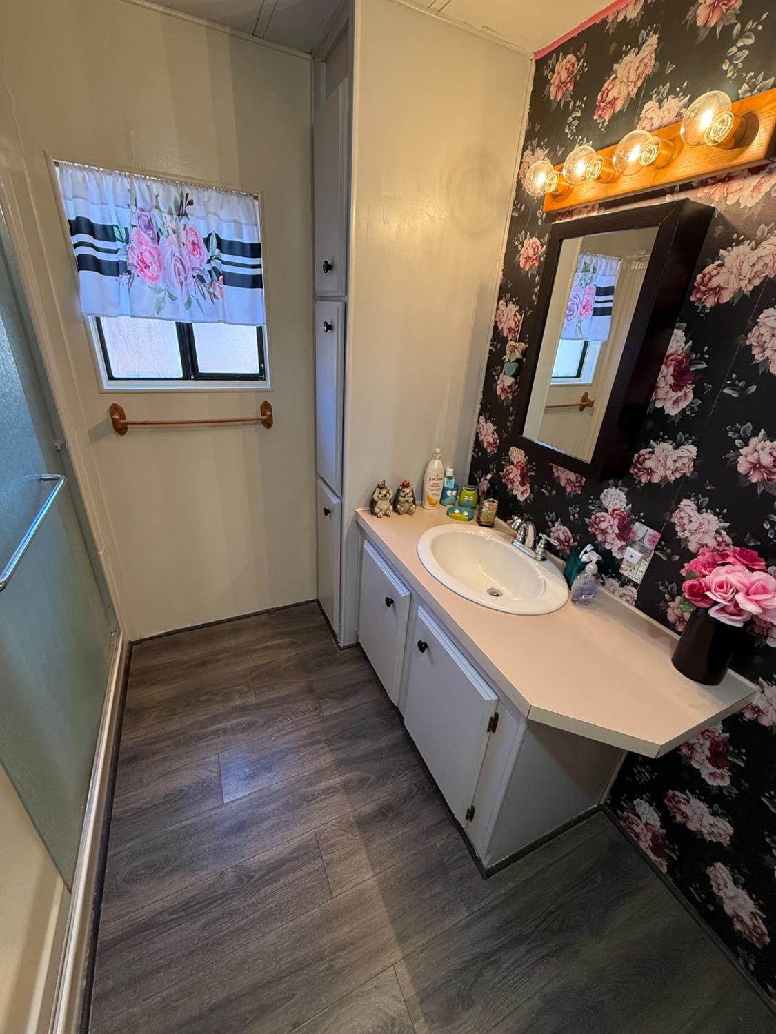2933 Forebay Road, Unit 10 Pollock Pines, CA 95726 - Photo 20 of 28 a bathroom with a sink mirror and vanity