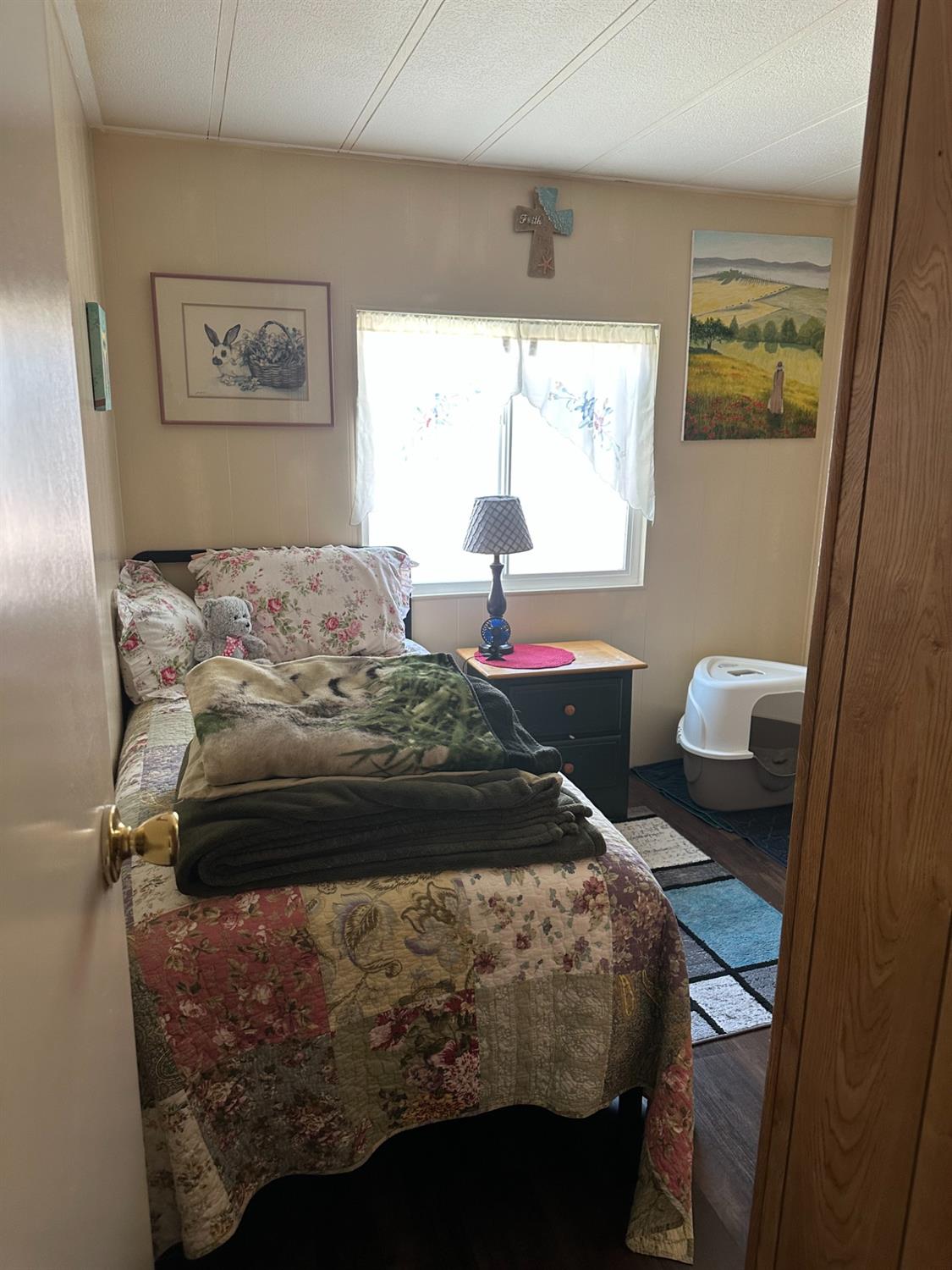 2933 Forebay Road, Unit 10 Pollock Pines, CA 95726 - Photo 5 of 28 a bedroom with a bed and window