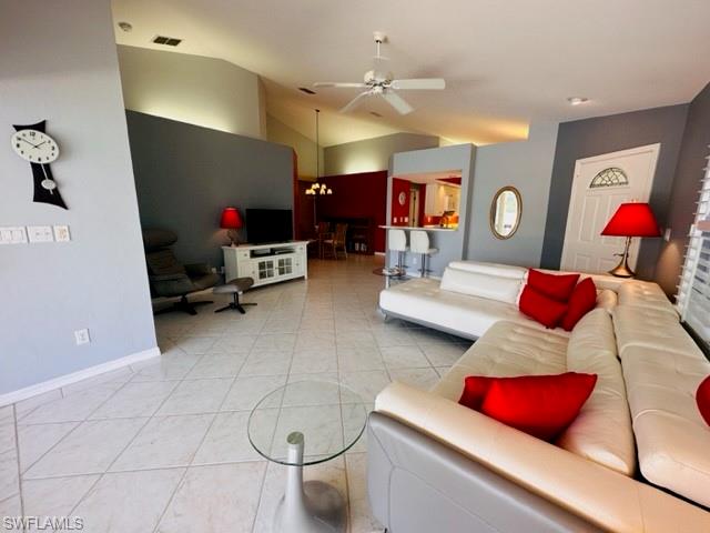 224 Napa Ridge Road East, Unit 12 Naples, FL 34119 - Photo 14 of 33 a living room with furniture and a couch